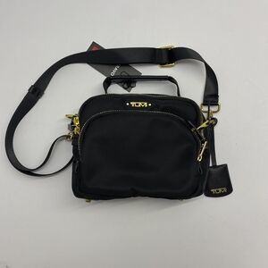 TUMI Black Belt Bag with Gold Details